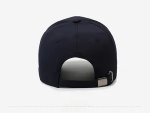 Detail showing the adjustable metal buckle and stitching on the back of a navy cotton cap