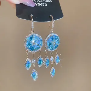 Elegant 925 silver drop earrings with blue crystals and sparkling zirconia detailing