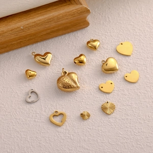 Polished and textured 18k gold heart-shaped stainless steel pendants for jewelry making