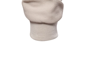 Detailed view of beige waffle knit fabric and ribbed cuff on a men's stand collar jacket