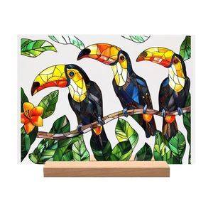 Artistic acrylic toucan plaque on wood base with stained glass texture and floral design