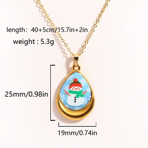 Gold-toned teardrop necklace with blue snowman pendant including size and weight specs