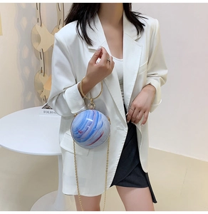 Chic spherical acrylic handbag with red blue marble pattern and gold ring handle