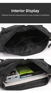 Detail view of large capacity black nylon messenger bag with multiple interior zipper pockets