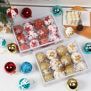 Christmas ornaments set with glitter snowflake and reindeer patterns in a clear gift box