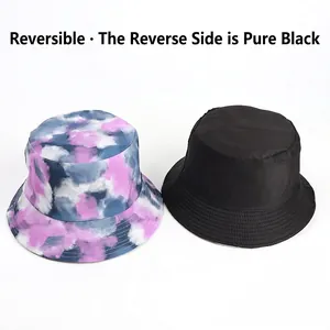 Reversible tie-dye bucket hat with colorful purple blue pattern and solid black interior
