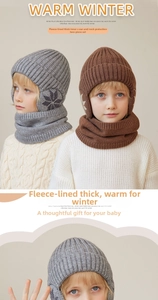 Close-up of thick fleece lining and knit texture of child winter hat and scarf set