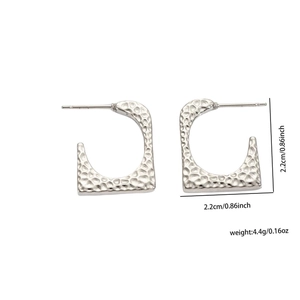 Detailed view of silver hammer textured earrings with precise size and weight measurements