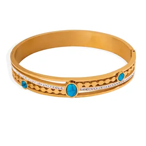 Vintage gold plated stainless steel bangle with turquoise stones and zircons