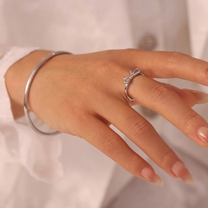 Polished silver bow ring and minimalist bangle set for women in stainless steel