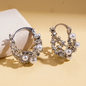 Retro hollow flower basket hoop earrings with pearls and diamonds on silver base