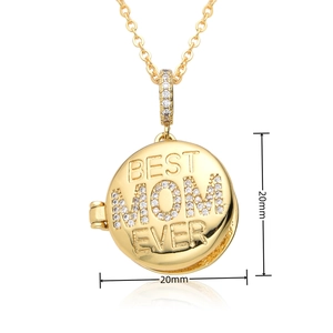 Detail of 20mm round gold photo locket with Best Mom Ever engraving and crystals