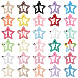 Matrix layout of 30 colorful Y2K star-shaped snap hair clips in vibrant candy colors