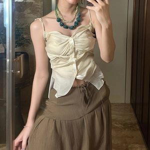 Retro acrylic geometric double necklace with cream top and brown pleated skirt