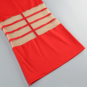 Detail of red bodycon dress featuring mesh patchwork and parallel ribbon strap accents
