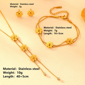 18K gold plated stainless steel daisy jewelry set with necklace, bracelet, and earrings
