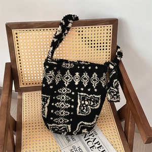 Close-up of leopard pattern plush shoulder bag on a vintage chair with soft texture details