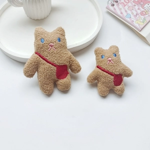 Cute brown plush bear charms in two sizes featuring red crossbody bag embroidery