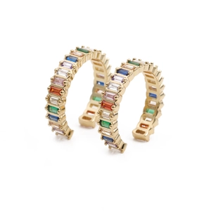 Golden hoop earrings with multi-colored rectangular zircon stones in a sleek design