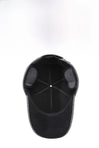 Detail of warm winter baseball cap featuring thickened fleece lining and ear protection flaps