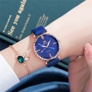 Women's quartz watch with navy blue strap, rose gold case and crystal dial accents