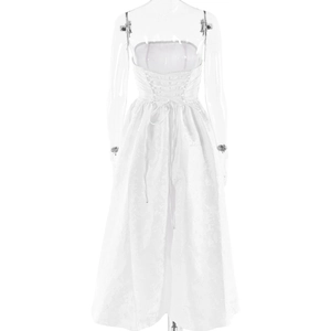 Back view of white strapless dress featuring intricate jacquard patterns and lace-up details