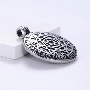 Vintage stainless steel Solomon hexagram pendant shown from a 45-degree angle