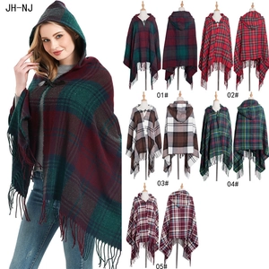 Plaid hooded poncho cape with leather buckle and fringe trim in five classic tartan patterns