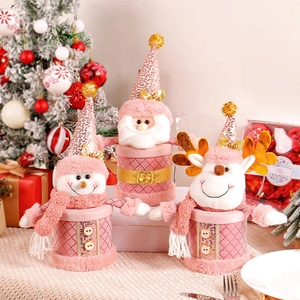 Pink Christmas gift box set featuring Santa, snowman, and reindeer figures with sequins