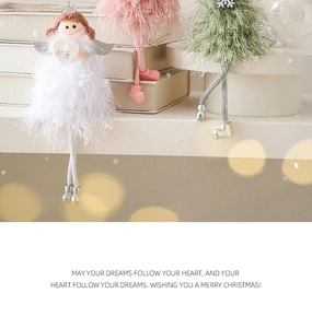 Detailed view of Christmas angel plush dolls with feather wings and knit texture