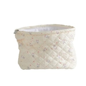 Trousse de maquillage matelassée avec motif de lapin floral et fermeture éclair en métal