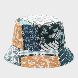 Cappello da pescatore patchwork retrò con fiori blu navy e senape per donna