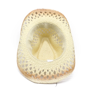 Close-up of the hollow woven interior and inner sweatband of this straw cowboy hat