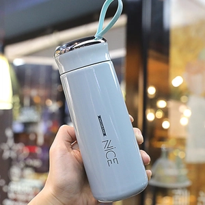 Portable light blue vacuum flask with carrying strap and stainless steel finish