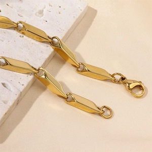 Detail of 18k gold plated hexagon link chain necklace with a secure lobster clasp