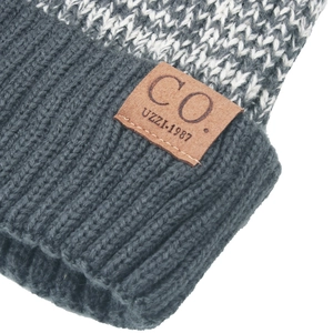 Winter knit beanie with gray jacquard pattern and premium leather logo patch