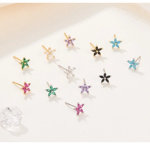 Detail of 925 silver flower stud earrings with colorful marquise-cut zircon stones