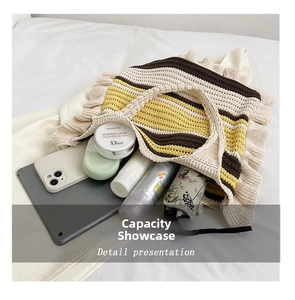 Internal view of the knit tote bag showing spacious capacity for tablets and essentials
