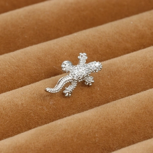Silver stainless steel gecko stud earring featuring micro-pave clear cubic zirconia stones