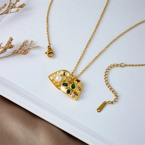 Golden heart locket necklace with colorful gemstones and white pearl inside for women