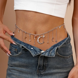 Silver waist chain belt with moon and star charms featuring pearls on a female model