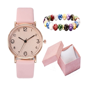 Pink leather strap watch and colorful beaded bracelet set in a pink gift box