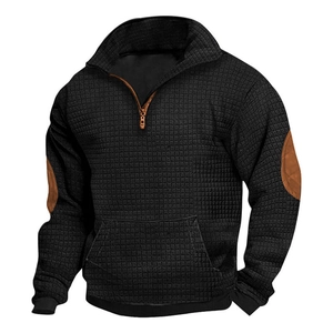 Men's black waffle knit sweatshirt with half-zip collar and brown contrast elbow patches