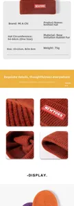 Detail view of brick red knit beanie showing 54-60cm head circumference size specifications