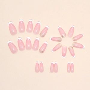 French white tipped pink press on nails set with silver glitter in ballerina shape