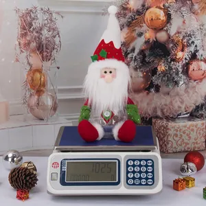 Santa Claus Christmas candy jar with knitted hat and clear storage base on a scale