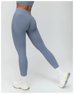 Detail view of high waist seamless yoga pants with scrunch butt lifting in dusty blue
