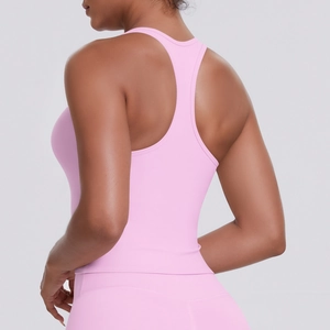 Rear view of pink racerback sports bra showing tight fit and elastic yoga fabric texture