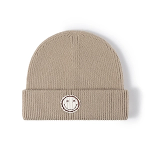 Khaki ribbed knit beanie with double folded cuff and embroidered smiley face patch