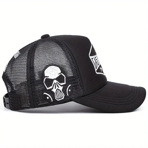Black mesh trucker hat with GAS patch and side skull embroidery shown in side profile